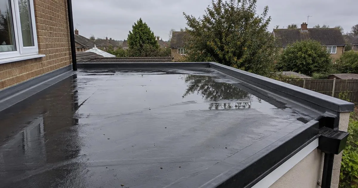 Flat roof being inspected by Hewitson Roofing in Northumberland